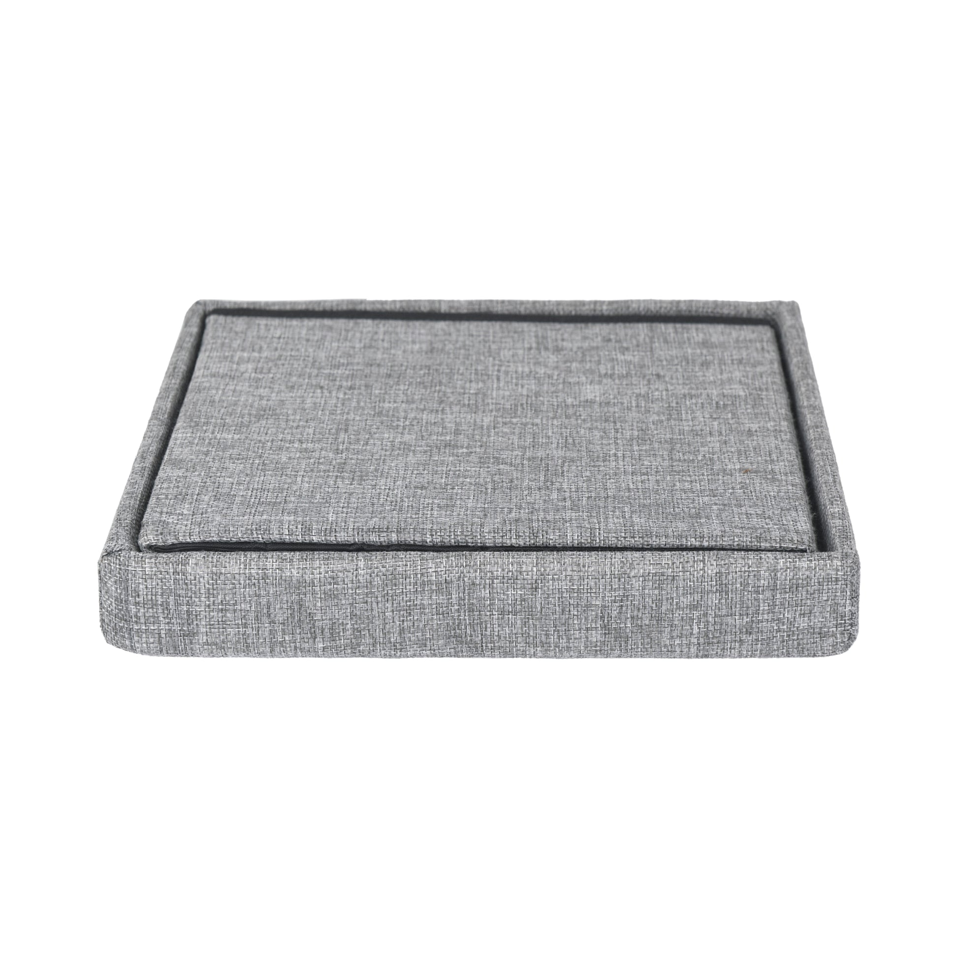 Grey linen square ottoman showing folded storage position